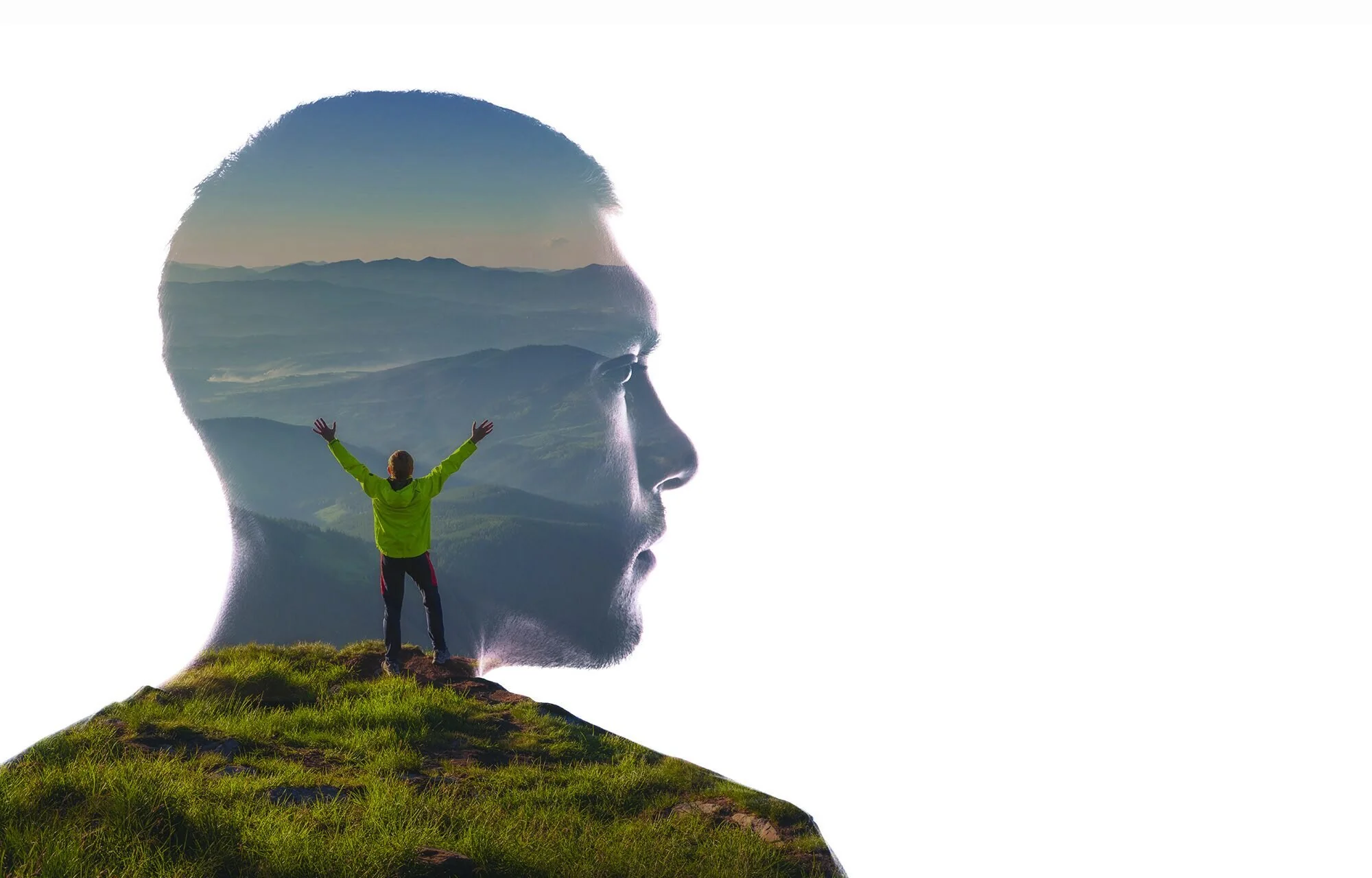 A man on a mountain top with his arms raised, seen inside the outline of a head, for men's check-ups at Memorial